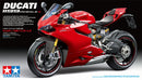 A scale model kit of a red Ducati 1199 Panigale S motorcycle by Tamiya.